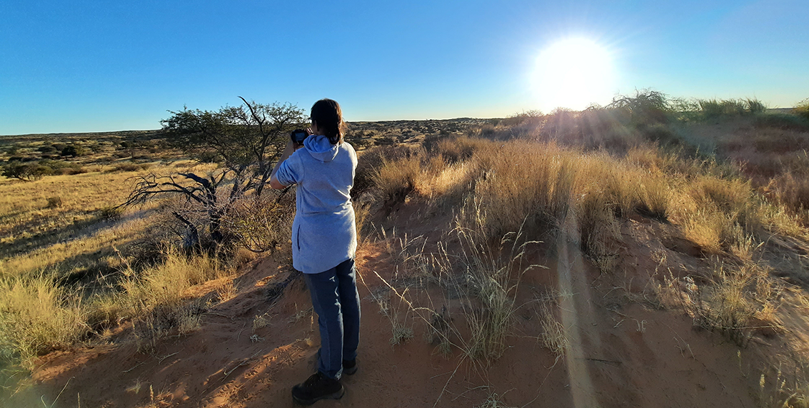 EWT field officer navigating Kalahari dunes